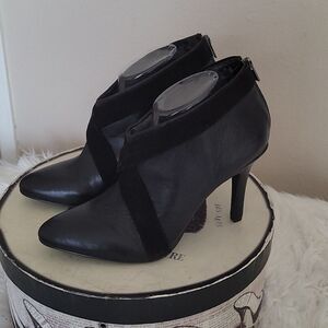 - Calvin Klein Black Leather Booties